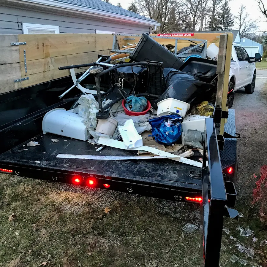 Roll-off dumpster delivered to a residential driveway in Laurens
